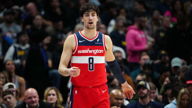 Feb 22, 2024; Denver, Colorado, USA; Washington Wizards forward Deni Avdija (8) calls out in the second quarter against the Denver Nuggets at Ball Arena. Mandatory Credit: Ron Chenoy-USA TODAY Sports